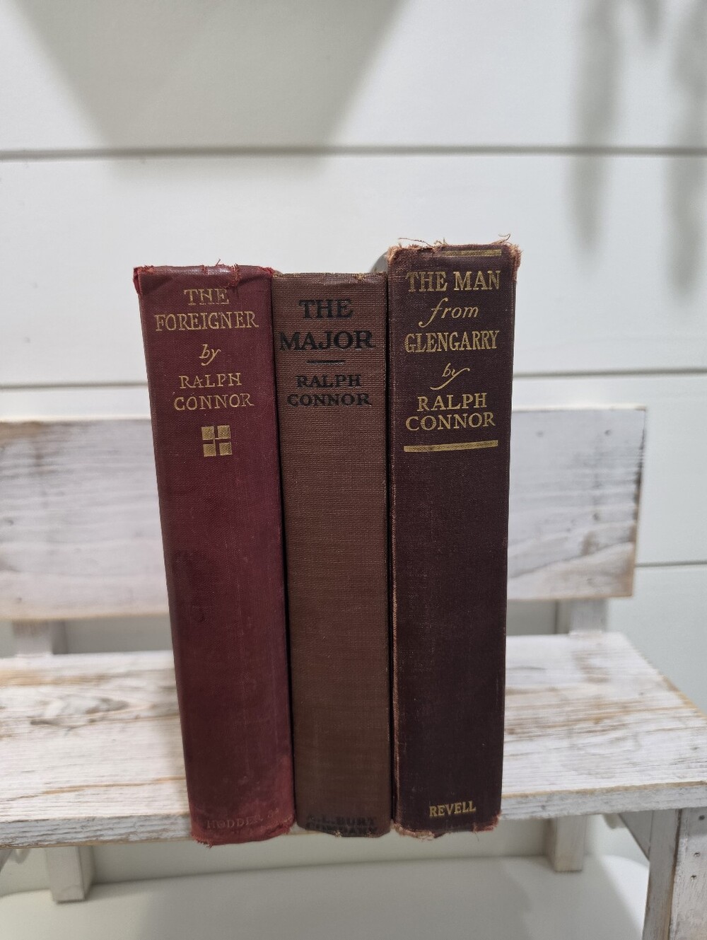 Three antique hardcover books written by Ralph Connor